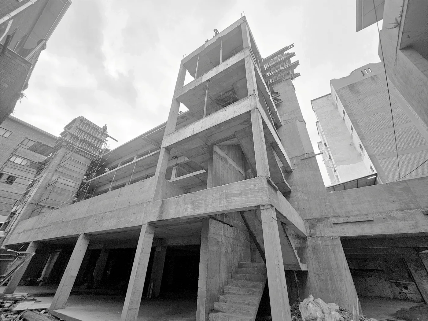 Multi-level concrete frame viewed from below