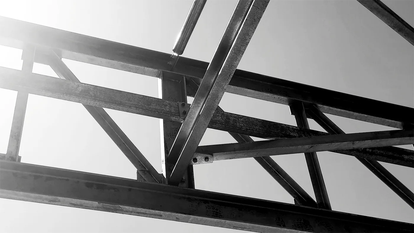 Close view of intersecting structural-steel roof members